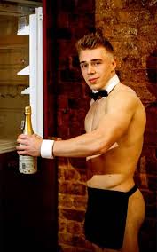 helpful hunks male stripper serving drinks